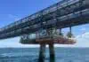ScaffFloat, a leading provider of modular pontoon solutions, has designed, built, and deployed a custom floating access system to support corrosion protection and maintenance on a large infrastructure project in Africa, enabling safe, full 360-degree access at more than 100 pile locations.